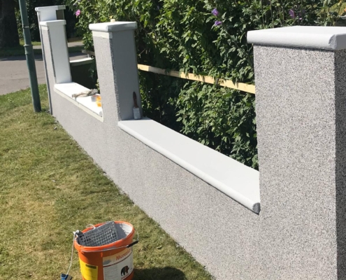 Wand aussen nachher Steinteppich